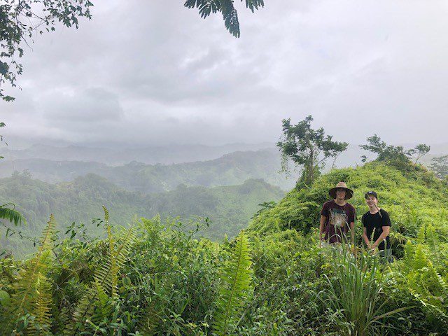 Picture of hikers in Hawaii, blooming their biome.