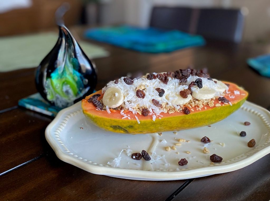 Picture of Papaya dressed in Coconut yogurt, Banana, Raisins, granola