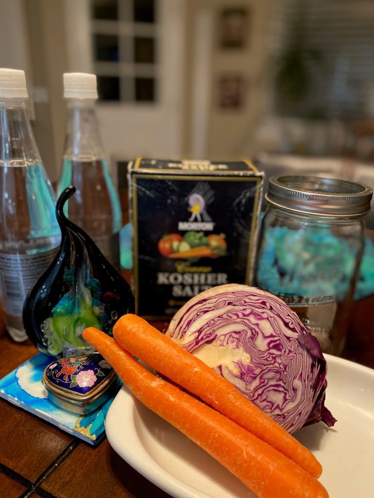Picture of cabbage and carrots to ferment as the top ten tips to restore gut health include ingesting probiotics made in fermented foods. 